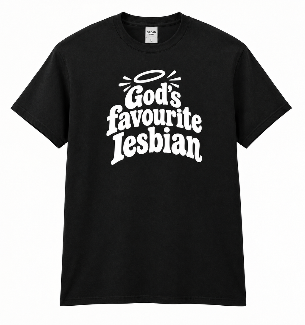 A black short-sleeve crewneck t-shirt with a white graphic text print reading 'God's favourite Lesbian' in a stylized font, featuring a halo illustration above the text.