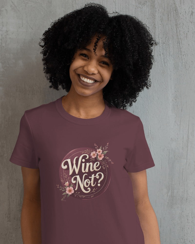Front view of Wine Not? slogan T-shirt by Savage Cotton, in dusty rose with cream print, styled casually for summer