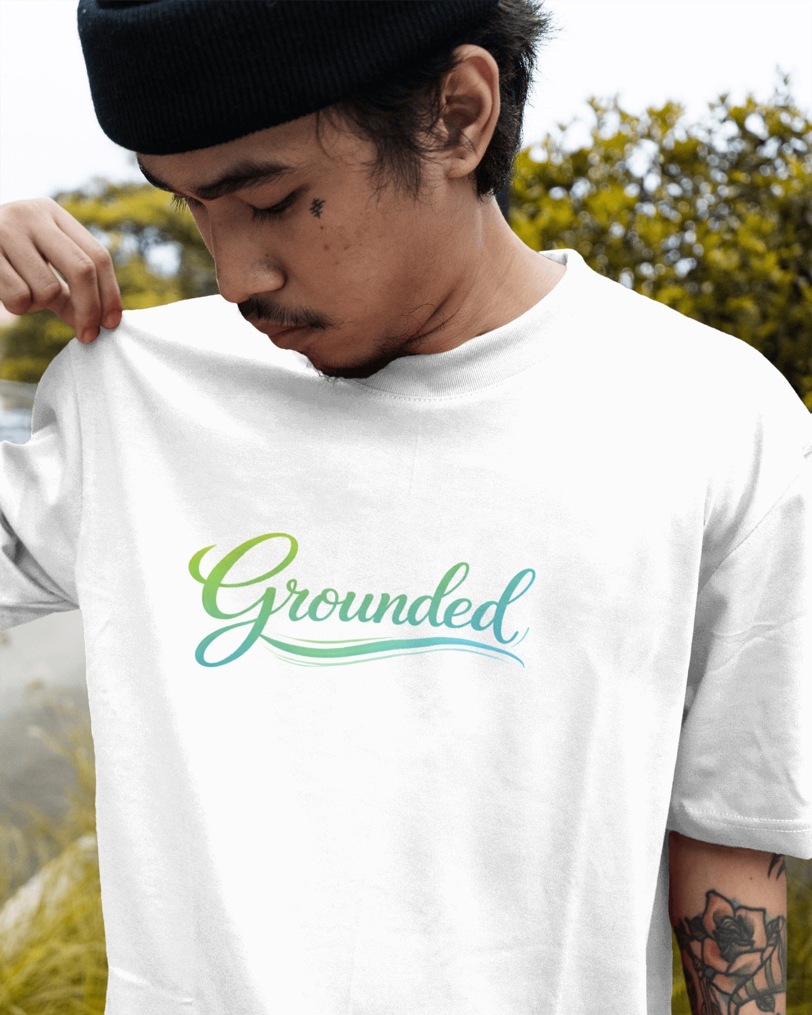 Grounded slogan printed on a minimalist unisex t-shirt with calm, understated typography