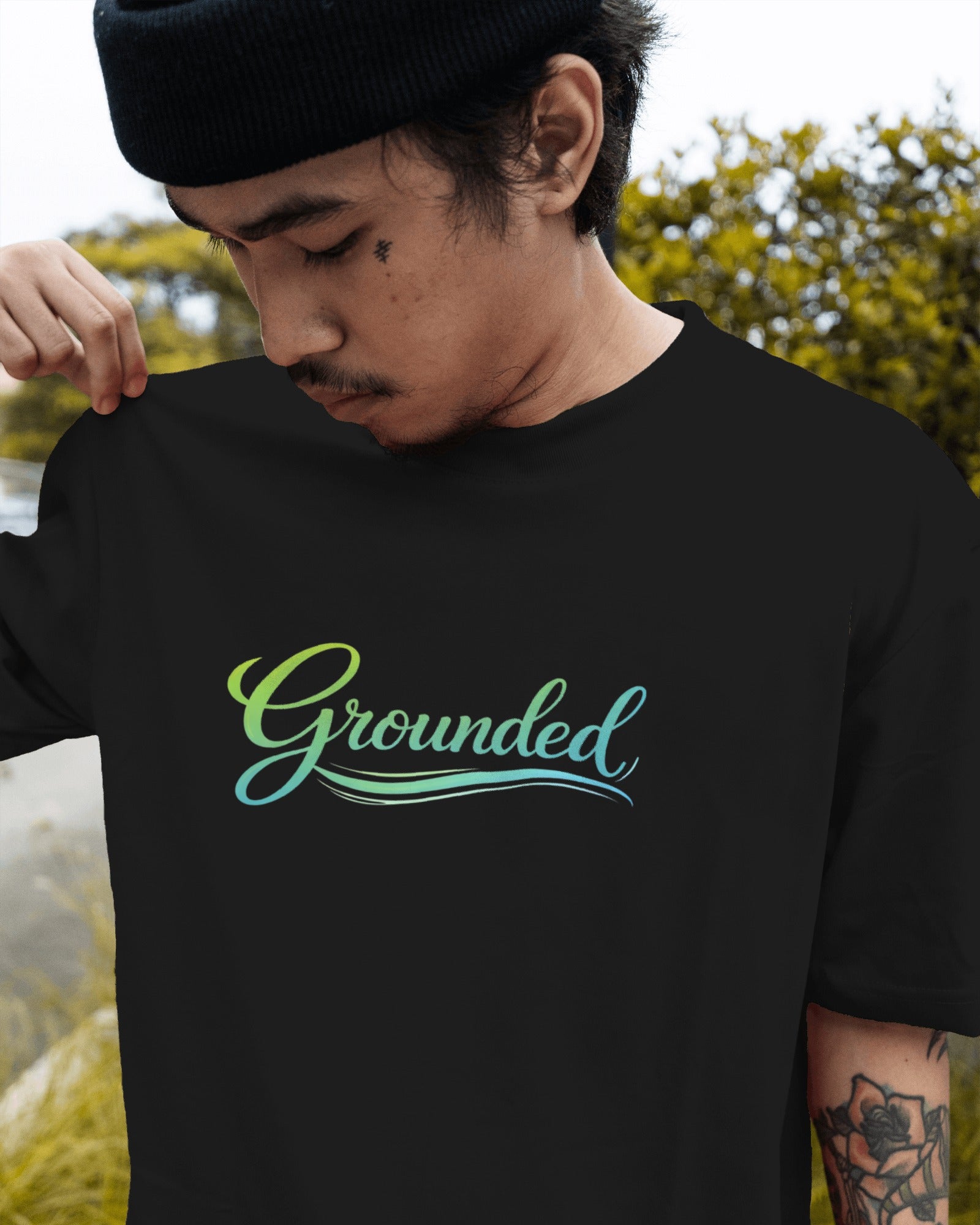 Grounded slogan printed on a minimalist unisex t-shirt with calm, understated typography