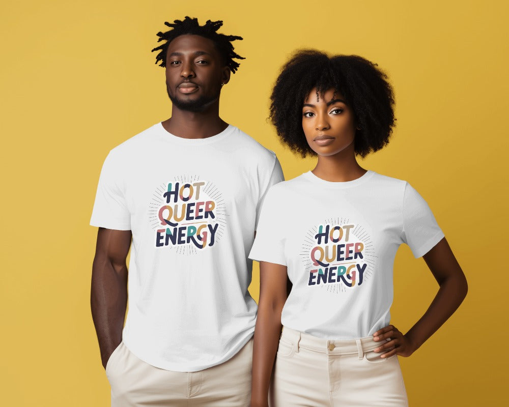Two people wearing white t-shirts with 'Hot Queer Energy' text on a yellow background