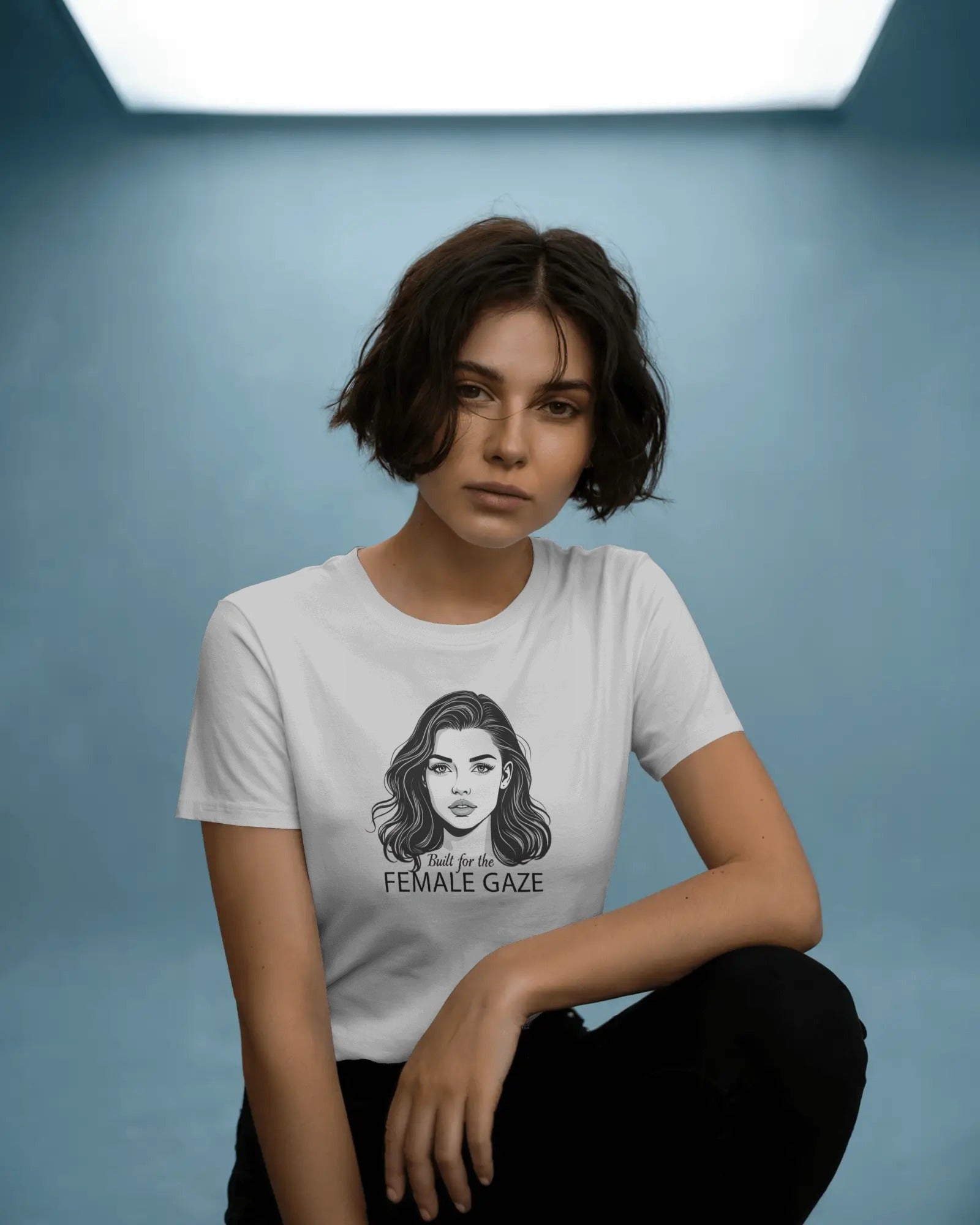 Built for the Female Gaze slogan printed on a unisex t-shirt with bold minimalist typography