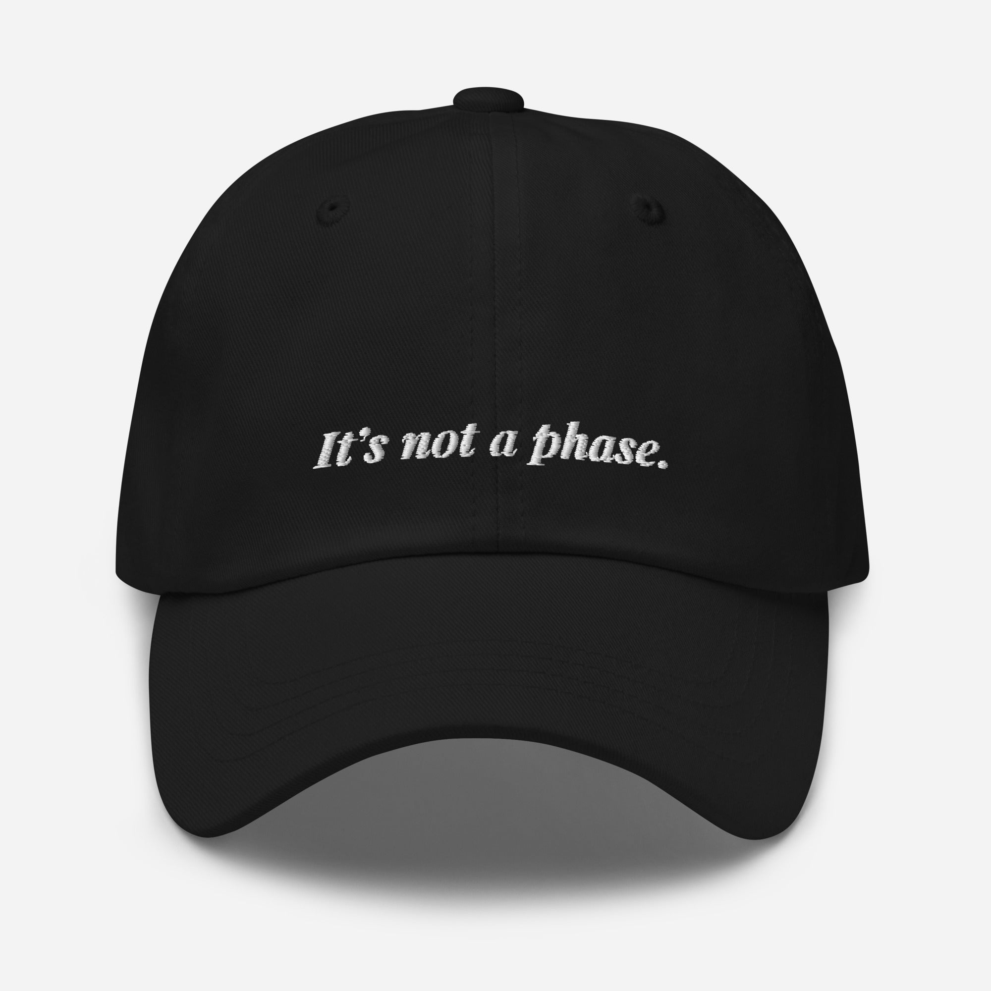Black cap with 'It's not a phase' text on a white background