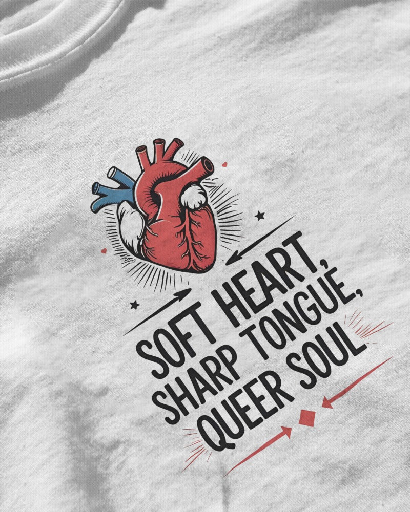 Close-up of Soft Heart, Sharp Tongue, Queer Soul graphic on soft cotton fabric