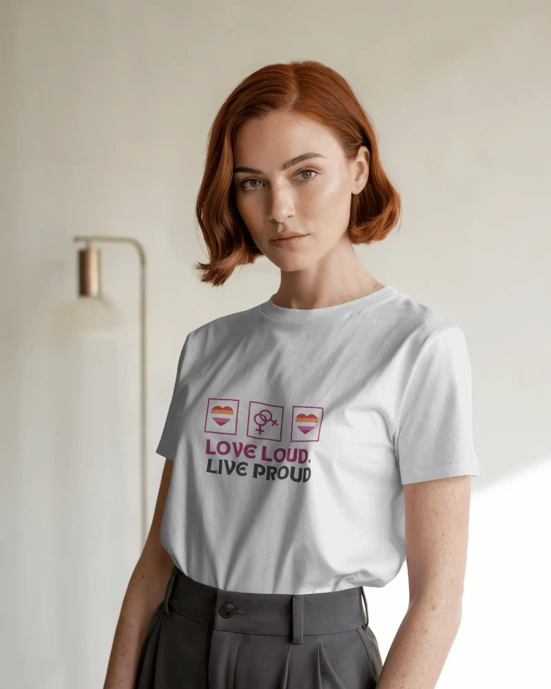 Front view of a "Love Loud, Live Proud" T-shirt with vibrant lesbian pride colors, featuring a bold and empowering design celebrating lesbian identity.