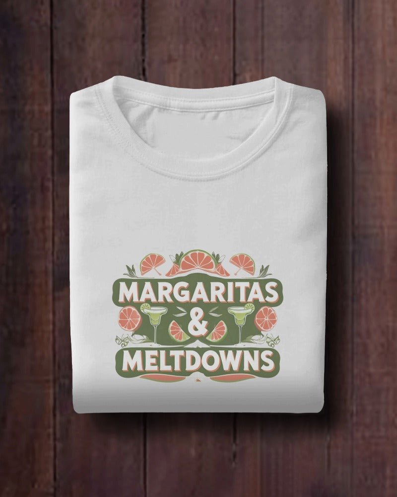 Model wearing Margaritas & Meltdowns slogan T-shirt by Savage Cotton in soft lime green, styled with sunglasses and bold lipstick for summer