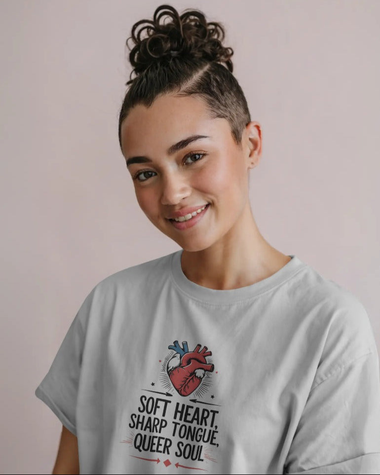 Close-up of Soft Heart, Sharp Tongue, Queer Soul graphic on soft cotton fabric