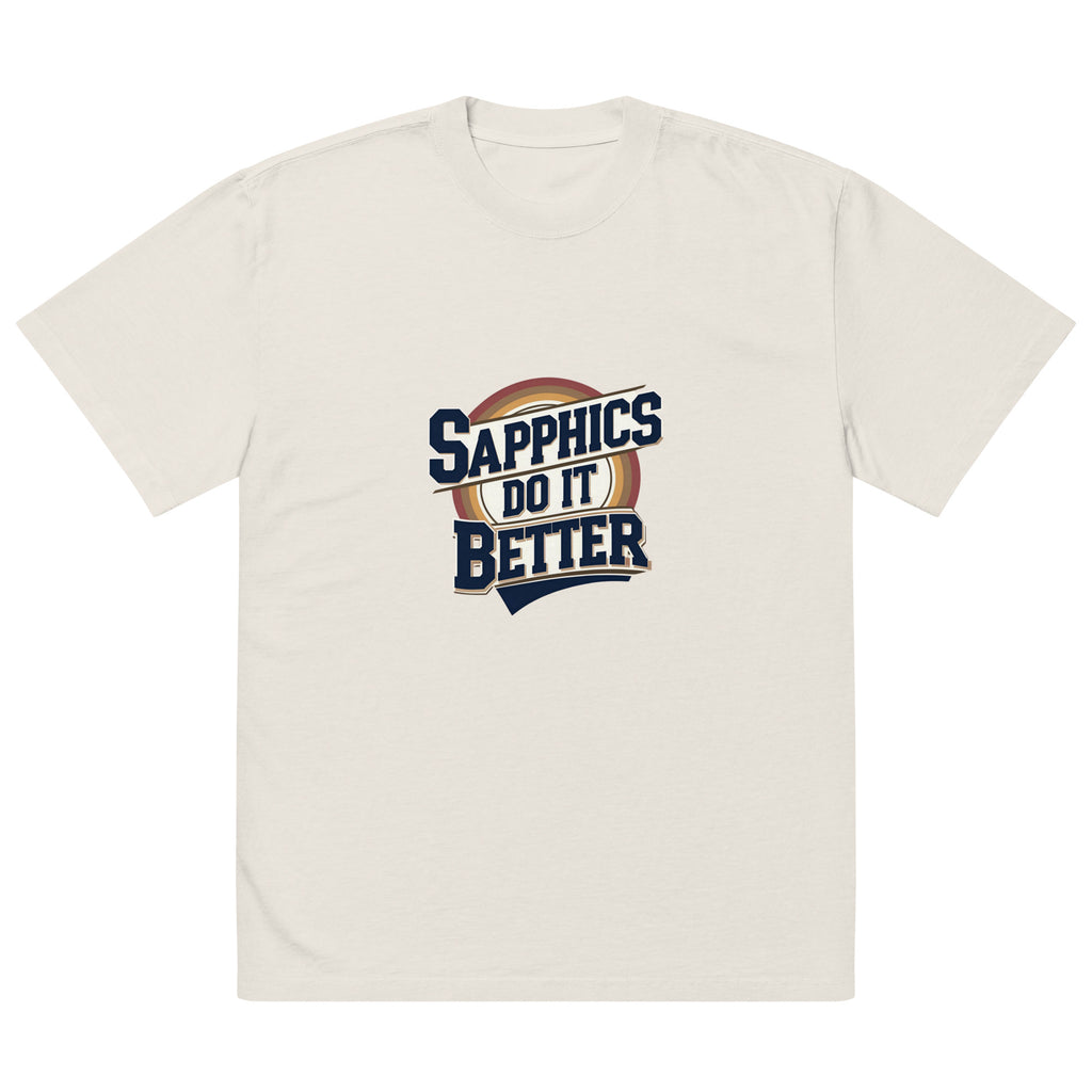 Model wearing oversized Shappics Do It Better slogan T-shirt by Savage Cotton in black with bold white print, styled with boots and attitude