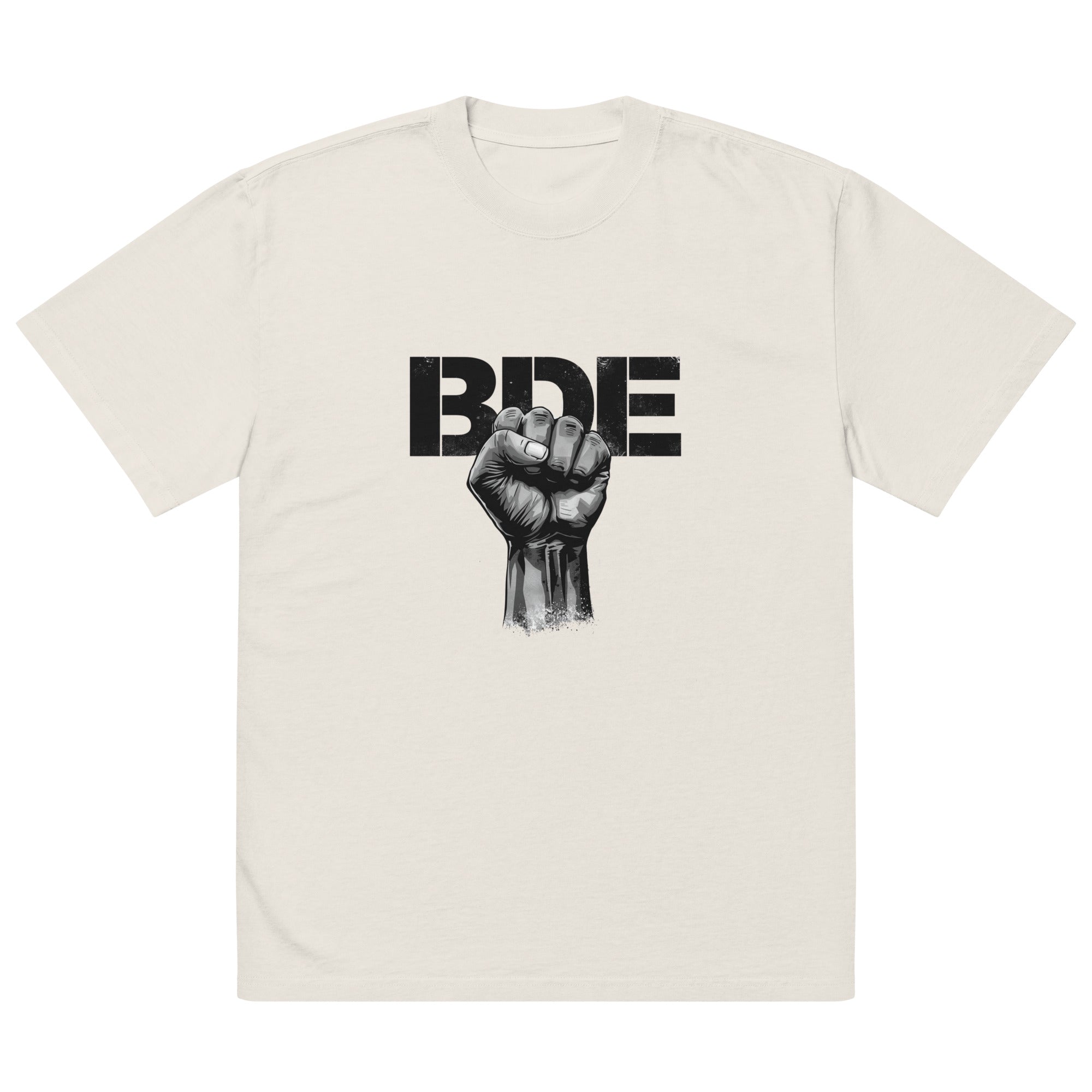 Masc lesbian wearing oversized BDE queer slogan t shirt