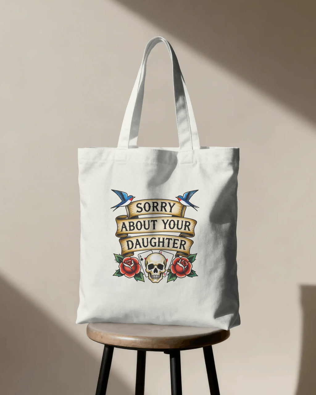 Tote bag with graphic design on a beige background