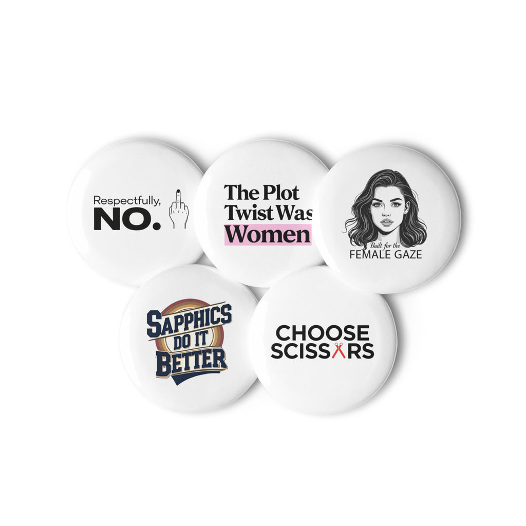 Close-up of five WLW-themed pins with glossy finish and bold queer designs