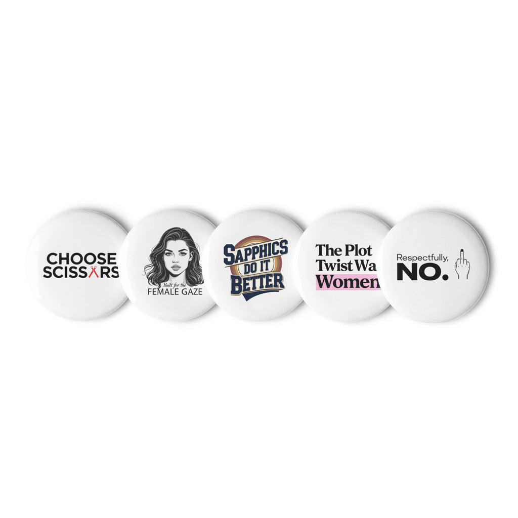 Close-up of five WLW-themed pins with glossy finish and bold queer designs