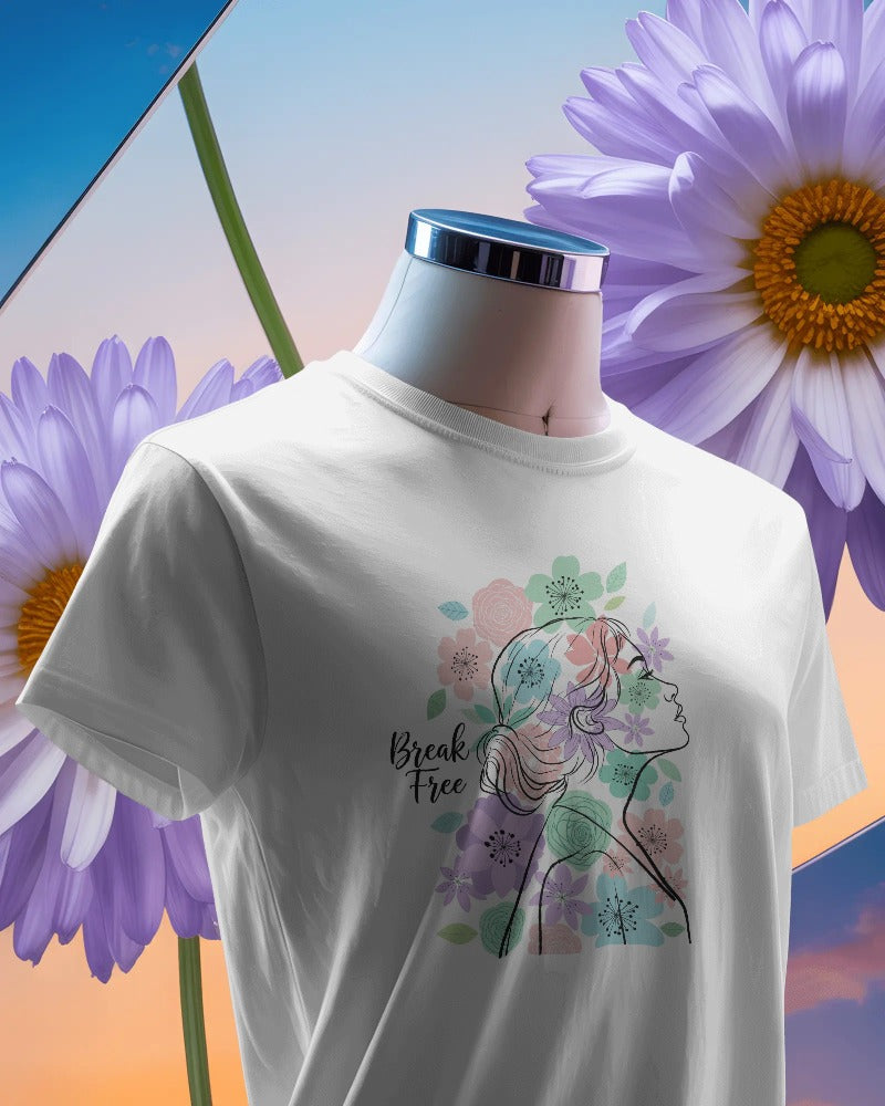 White t-shirt with a colorful graphic design on a mannequin against a floral background