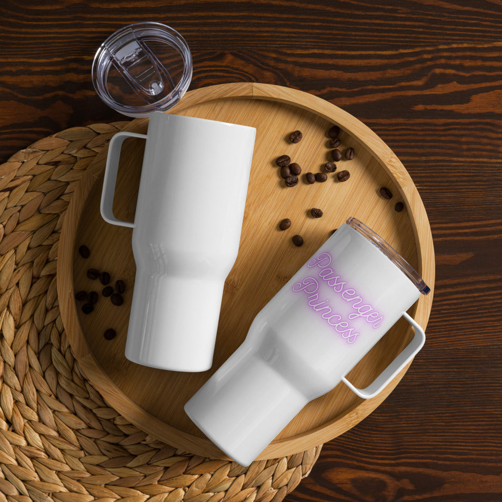 Two white travel mugs on a wooden tray with coffee beans and a clear lid.