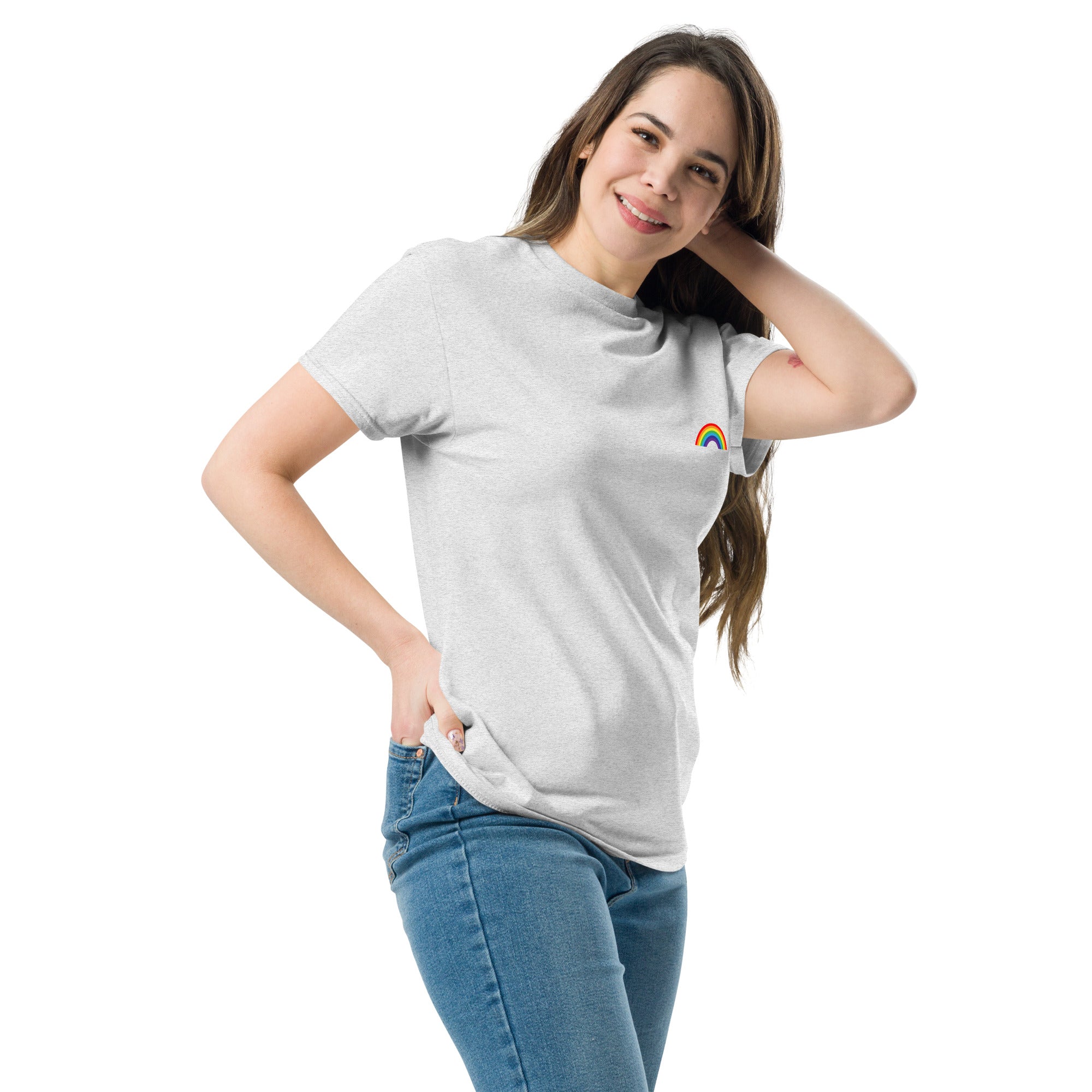 Woman wearing a gray t-shirt with a rainbow design on a white background