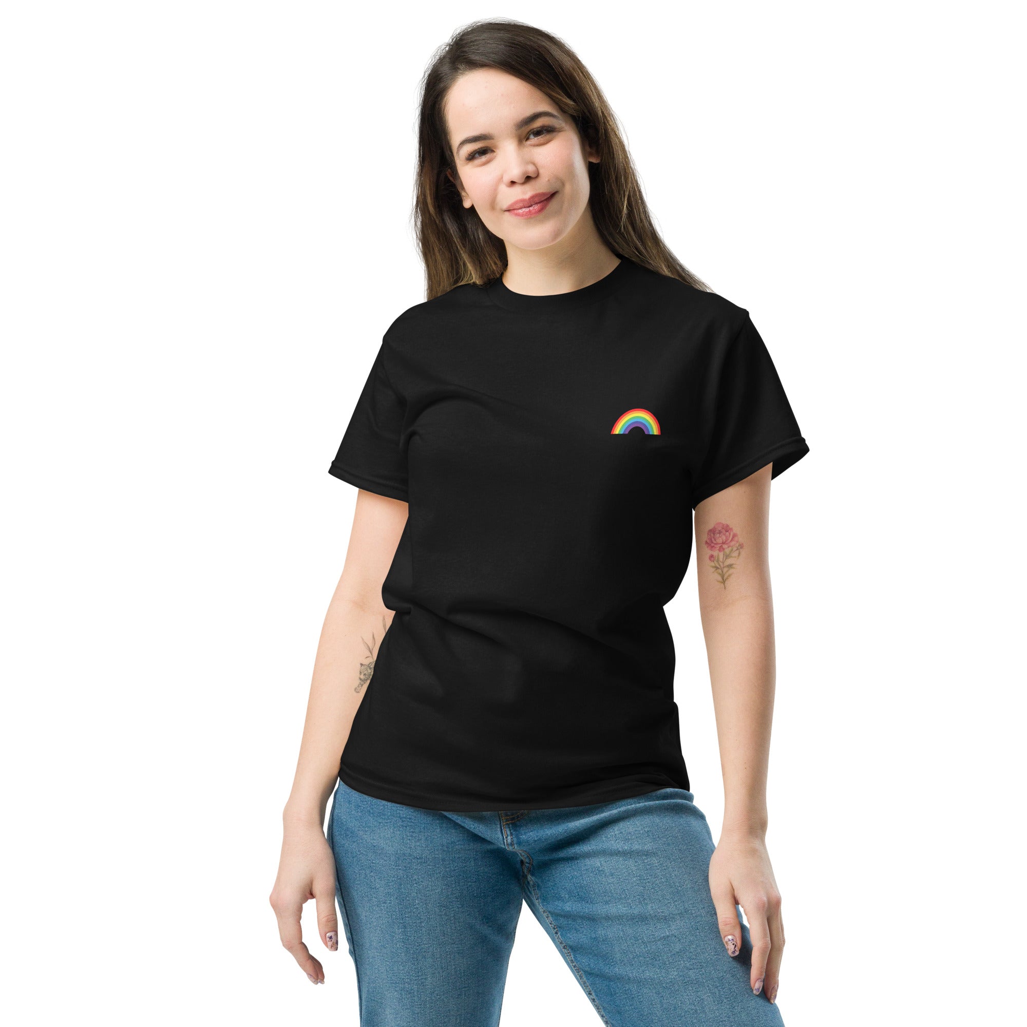Woman wearing a black t-shirt with a rainbow design on a white background
