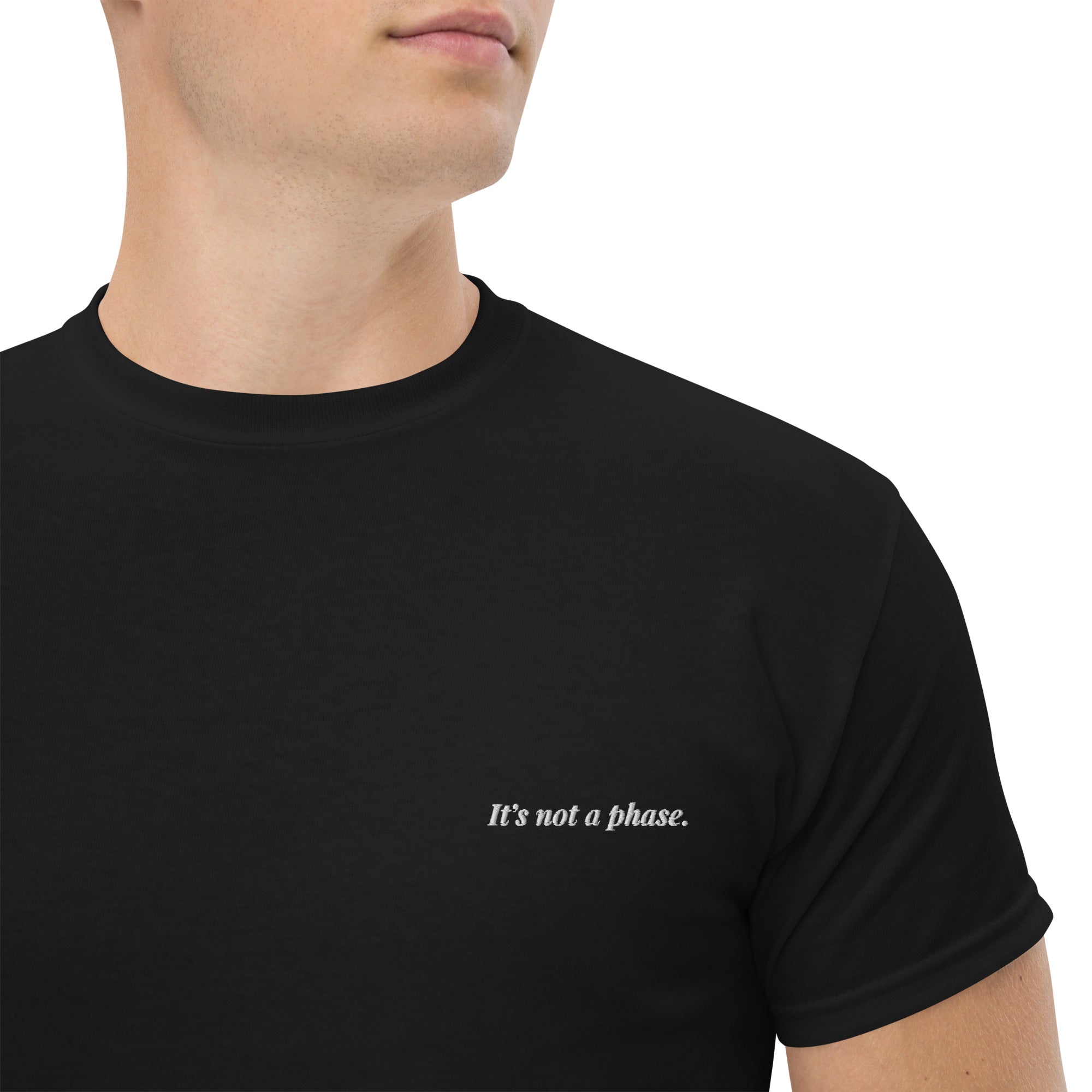 Black t-shirt with 'It's not a phase.' text on a white background