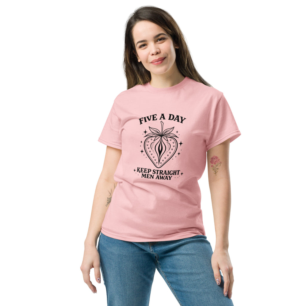 Woman wearing a pink t-shirt with a tree design on a white background