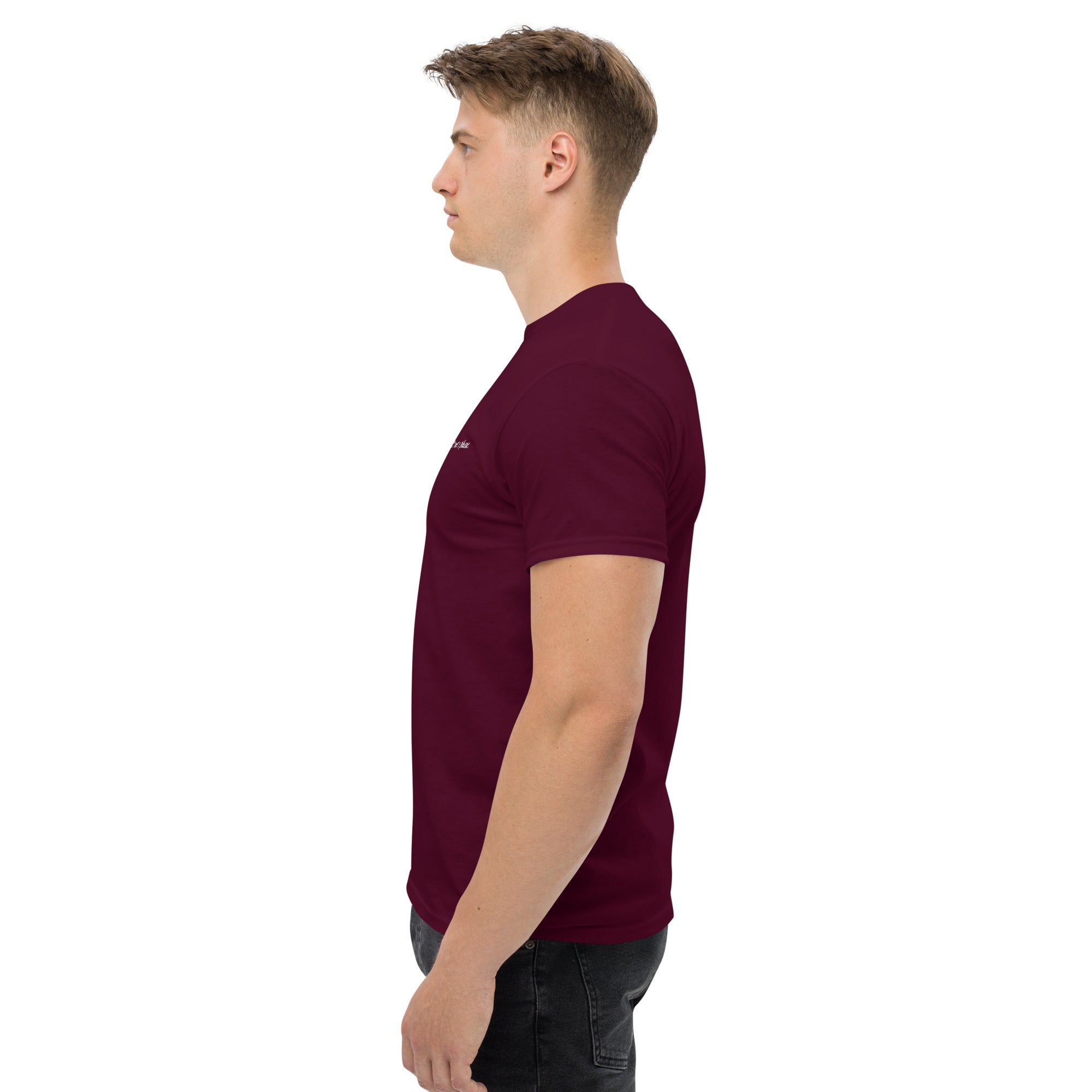 Man wearing a maroon t-shirt on a white background