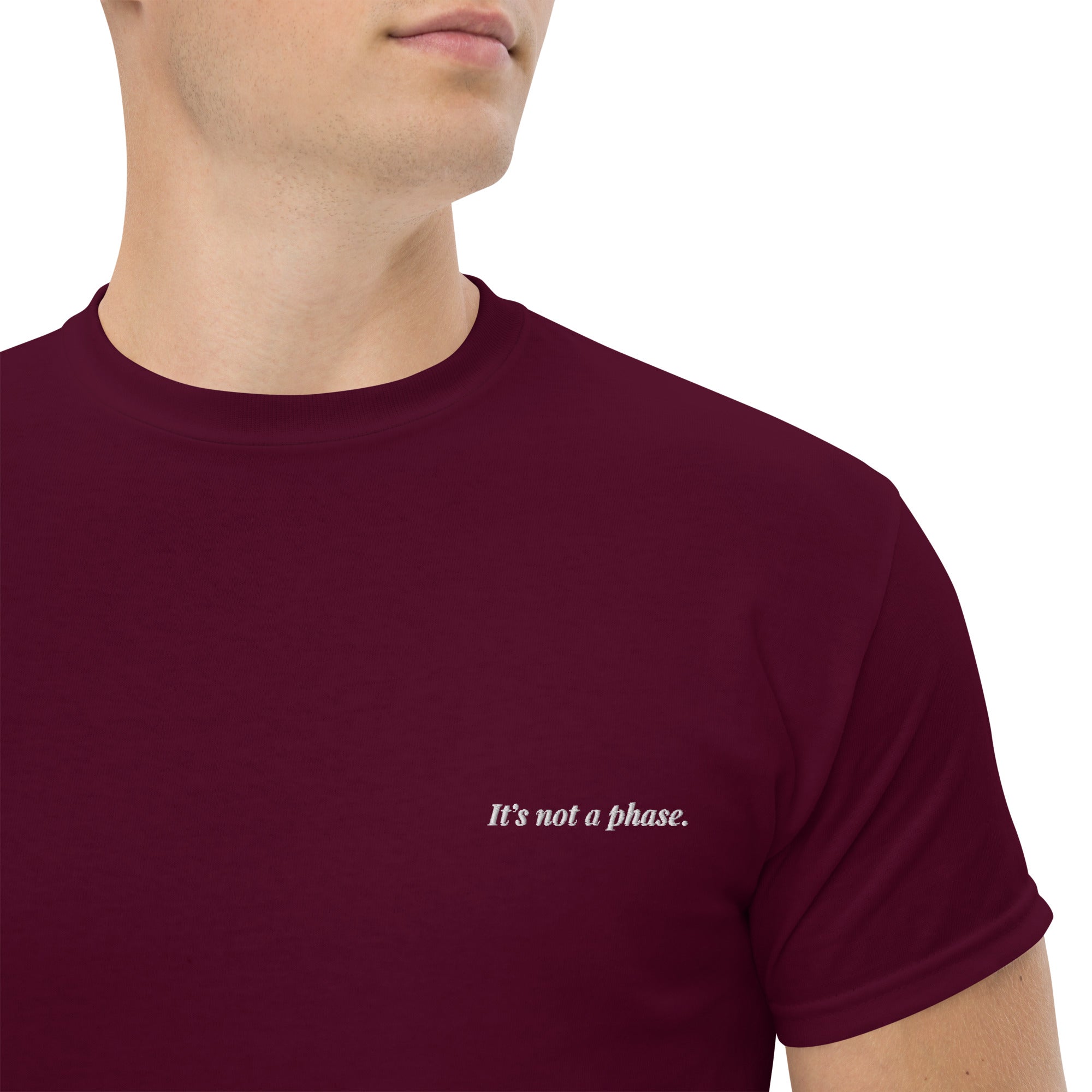 Maroon t-shirt with 'It's not a phase.' text on a white background