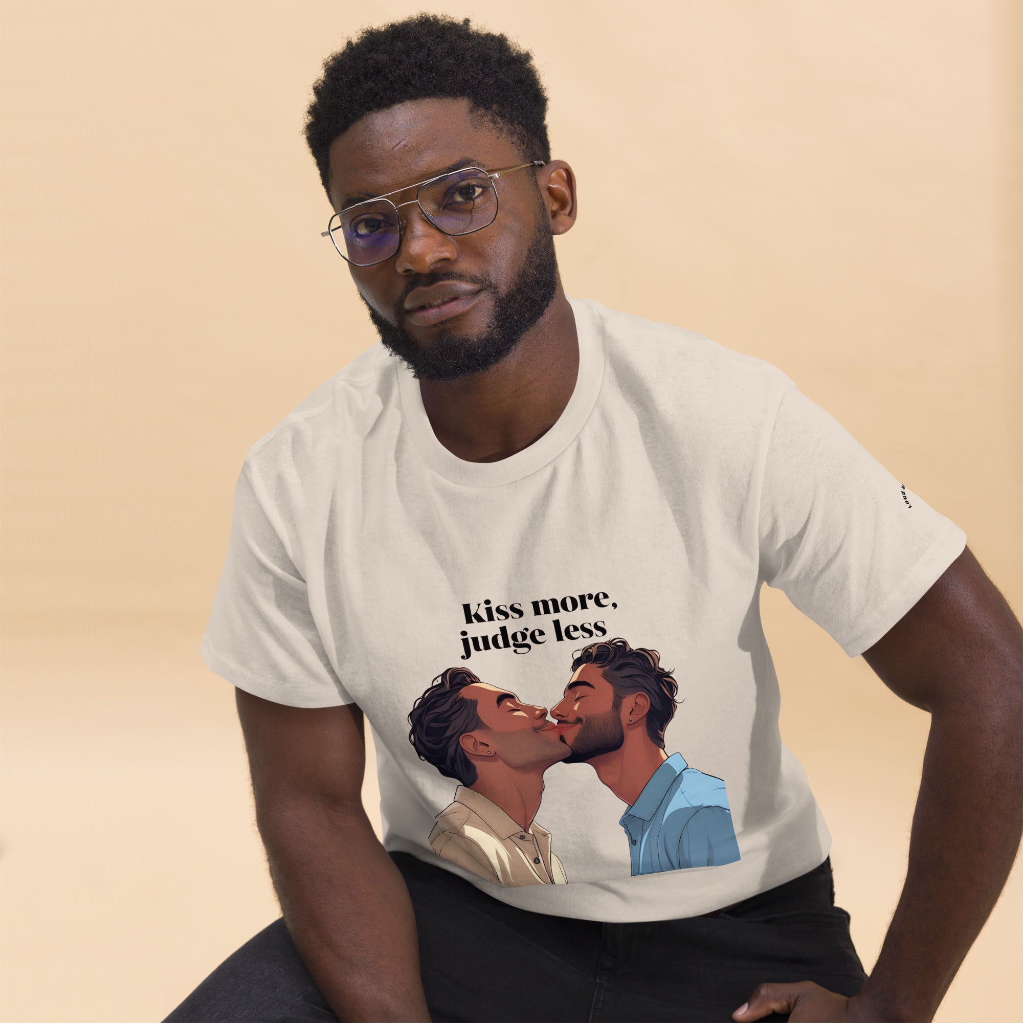 Man wearing a white t-shirt with a graphic design and text on a beige background