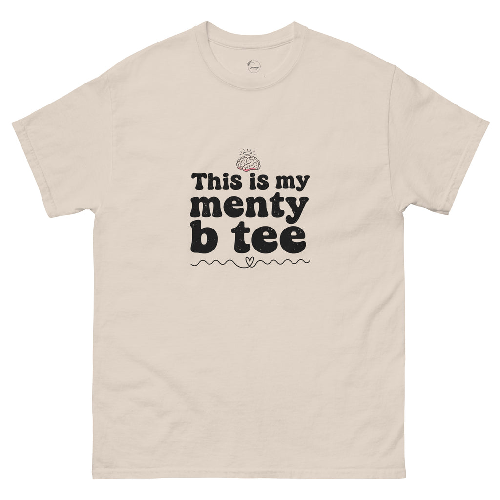 Beige t-shirt with black text 'This is my menty b tee' on a white background