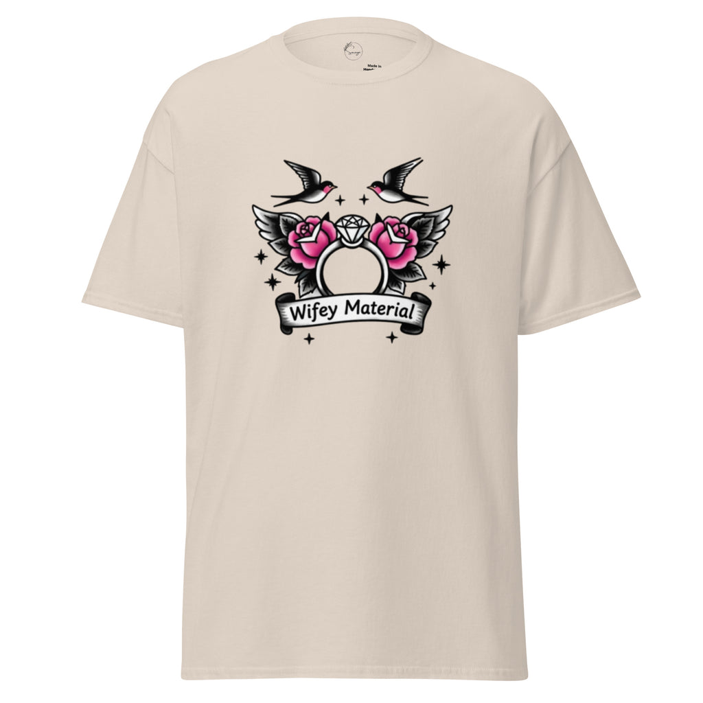 Beige t-shirt with a graphic design featuring roses, birds, and text on a white background
