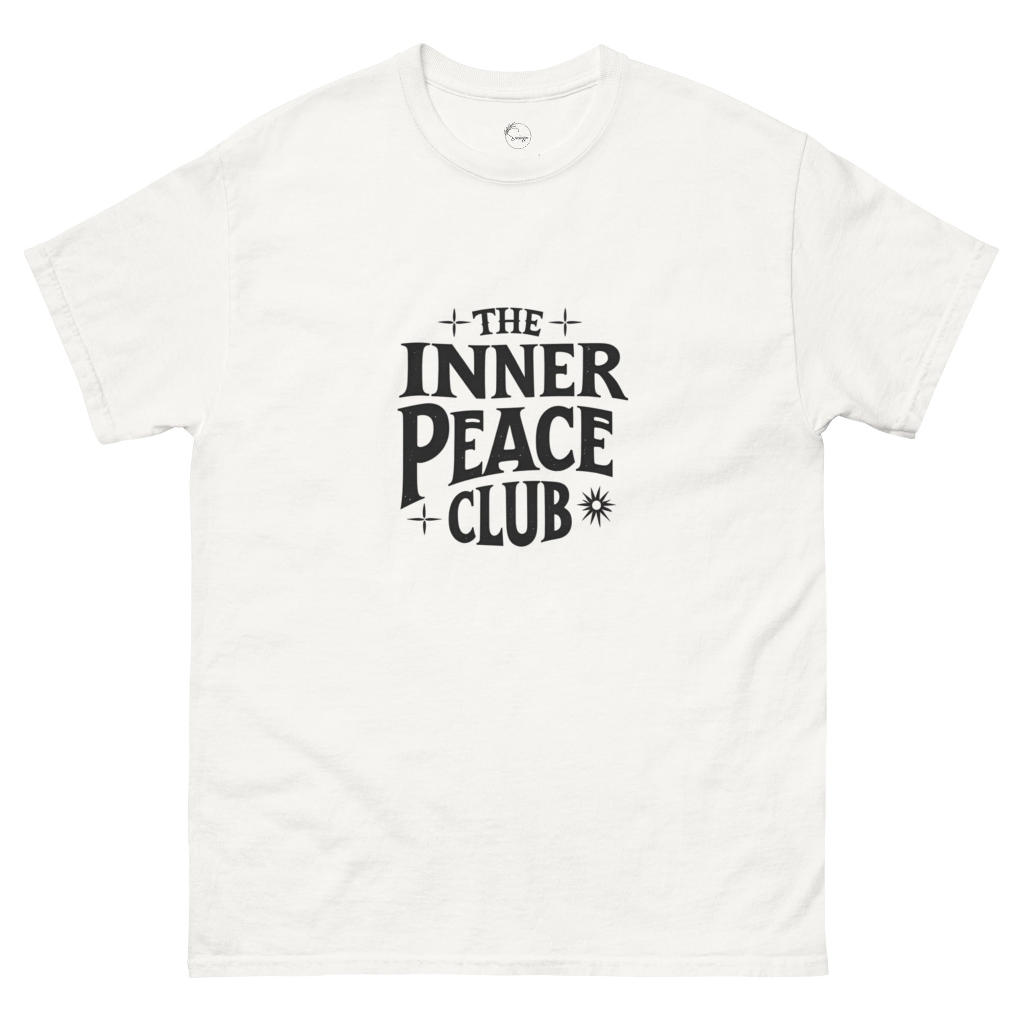 Flat lay of a cream-colored “The Inner Peace Club” t-shirt with soft lettering, styled with pastel accessories and cozy neutral tones.