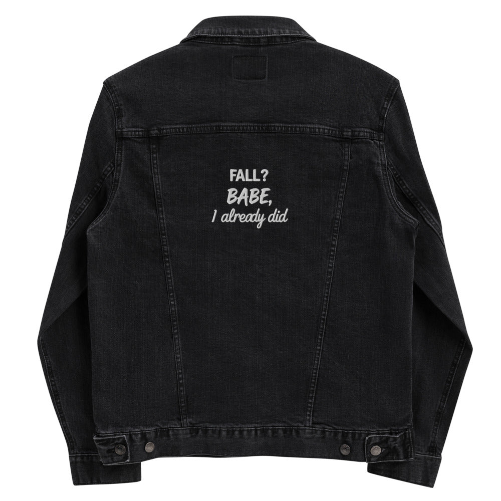 Black denim jacket with text on the back against a white background