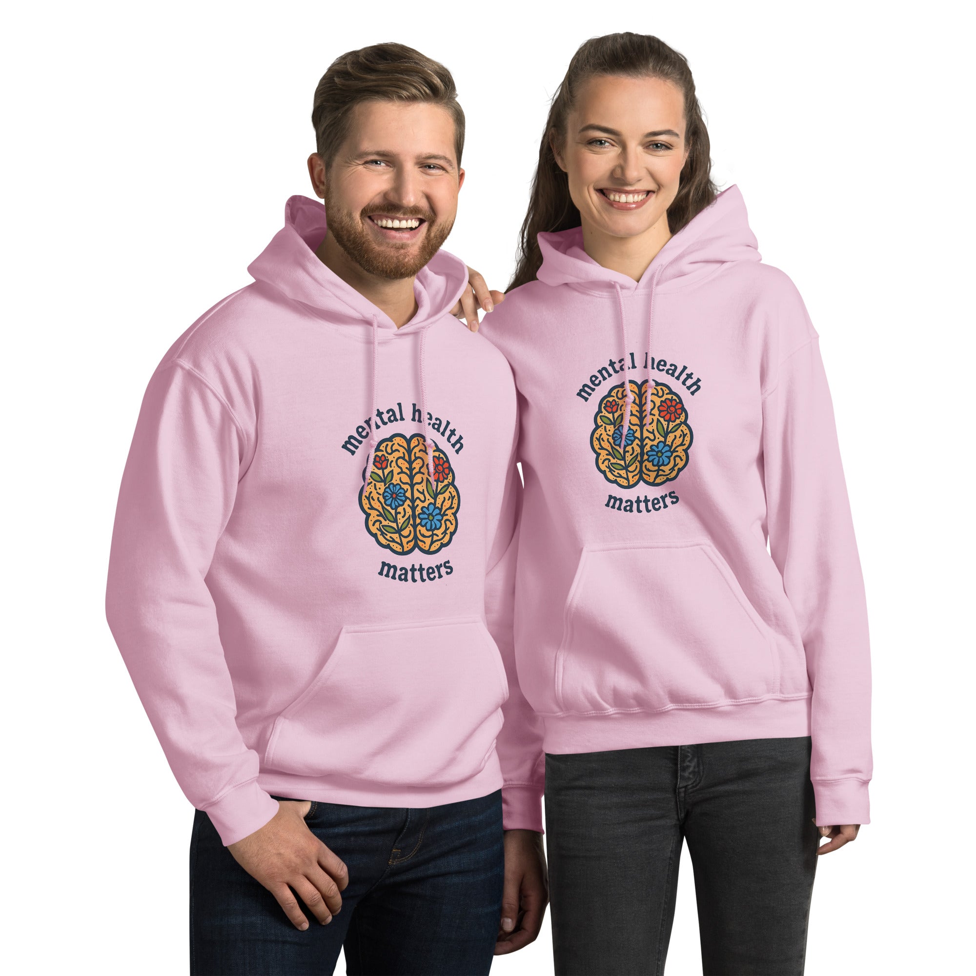 Two people wearing pink hoodies with a brain design and 'mental health matters' text on a white background.