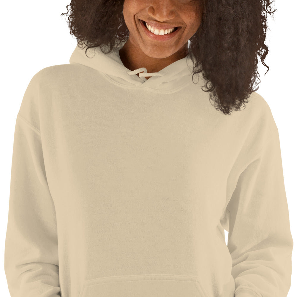 Person wearing a beige hoodie on a white background