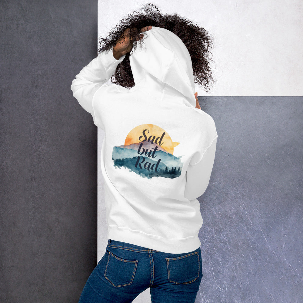 Person wearing a white hoodie with a graphic design and text on the back, standing against a gray and white background.