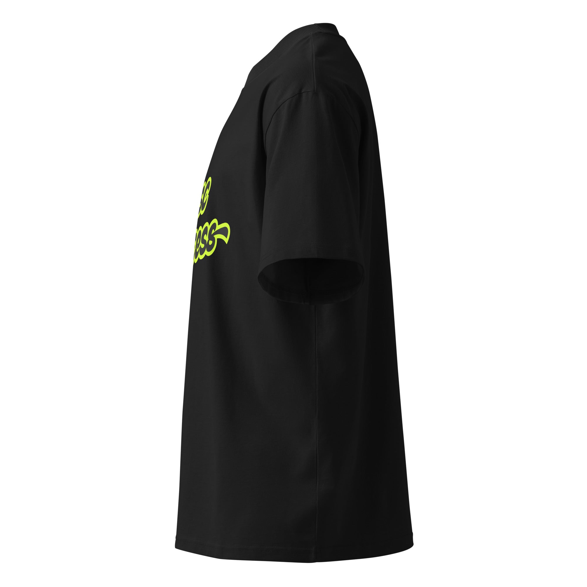 Female model wearing black Masc Princess oversized t-shirt with neon green slogan, styled with ripped jeans and sunglasses, queer streetwear fashion