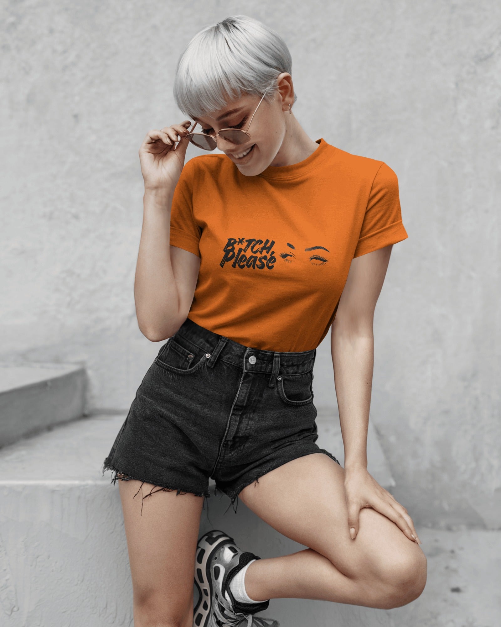 Close-up of B*tch, Please graphic t-shirt styled casually, expressive slogan fashion