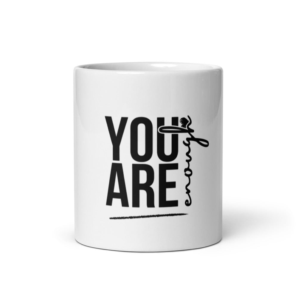 “White ceramic mug with bold black text reading ‘You Are Enough’”