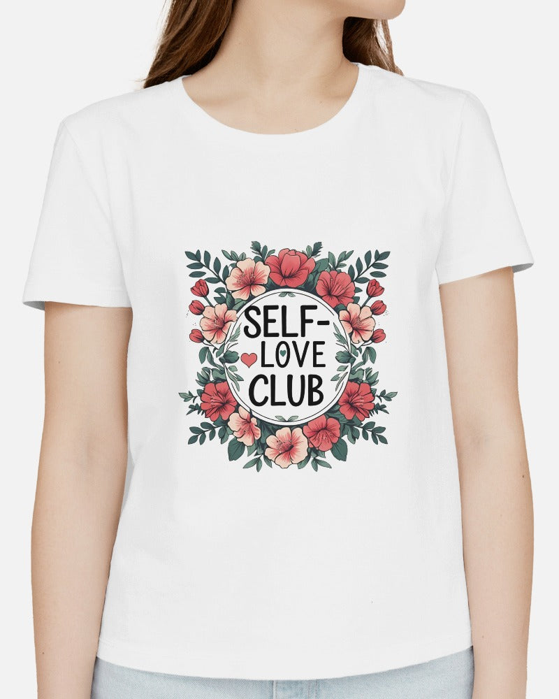 Woman wearing a "Love Yourself First" T-shirt in soft cotton, smiling confidently outdoors.