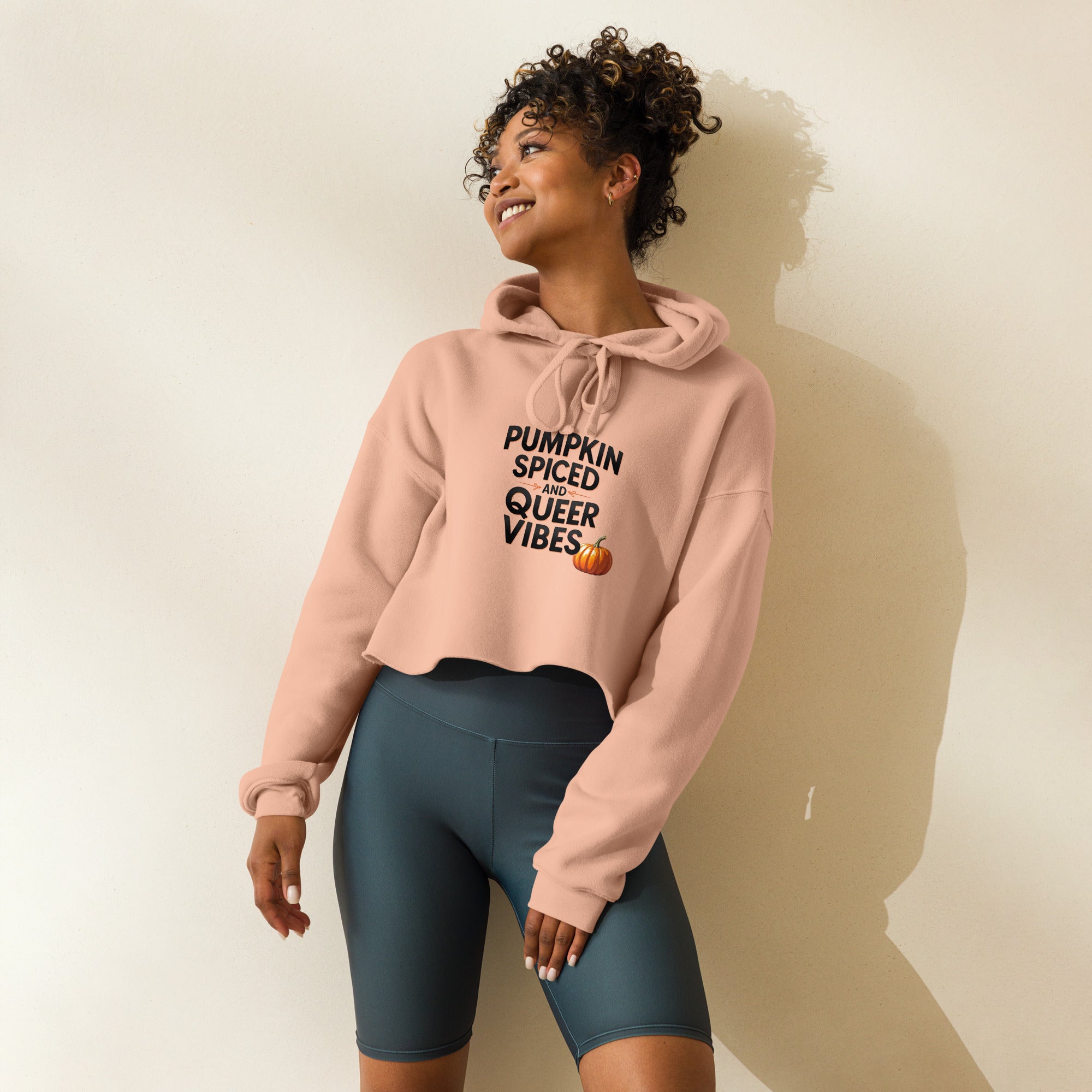 Model wearing Pumpkin Spiced Queer Vibes cropped hoodie